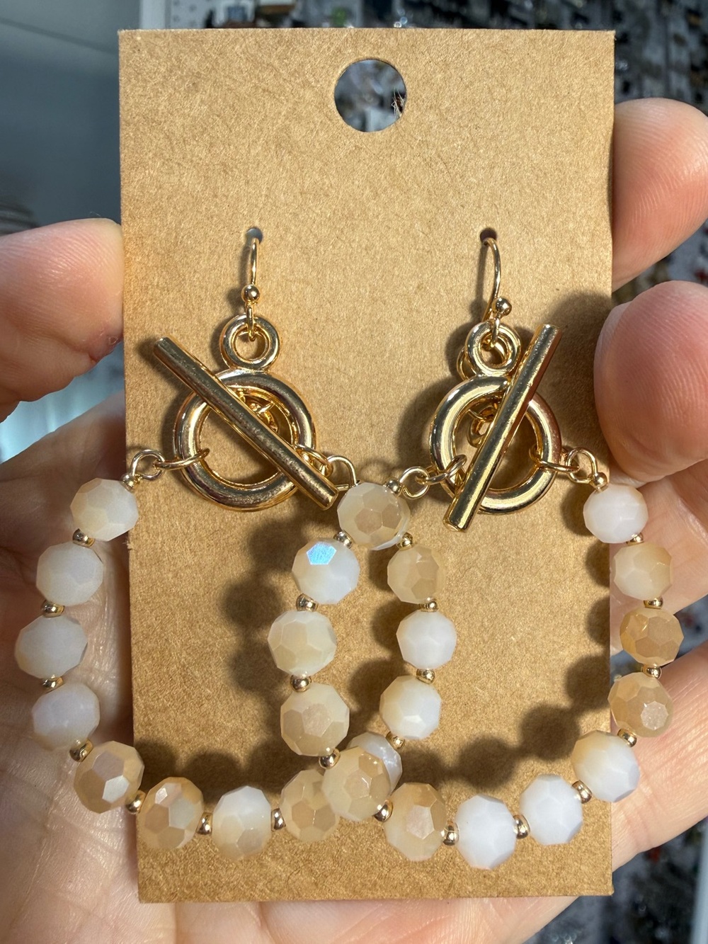 Gold Toggle Hoop Earrings with Cream Faceted Beads